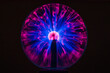 © Atanas - Magenta-blue glowing plasma ball on black background