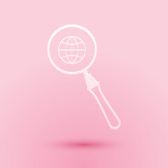 Poster - paper cut magnifying glass with globe icon isolated on pink background. analyzing the world. global 