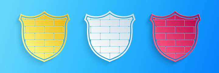 Wall Mural - Paper cut Shield with cyber security brick wall icon isolated on blue background. Data protection symbol. Firewall logo. Network protection. Paper art style. Vector.