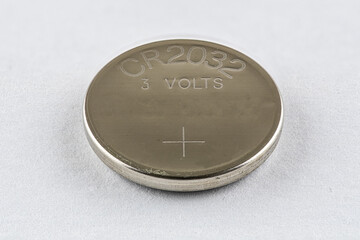 A CR2032 button cell lithium battery