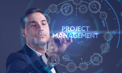 Business, Technology, Internet and network concept. Young businessman working on a virtual screen of the future and sees the inscription: Project management