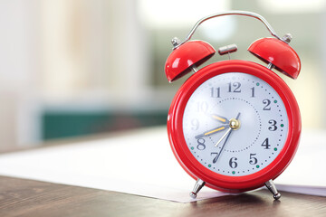 Close up of the alarm clock on the desk