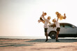 © Garun Studios - Asian family vacation holiday,Happy family, parents holding children flying in the sky.Concept family and Holiday and travel.