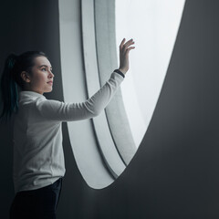 Wall Mural - Girl using touch screen at a modern education center