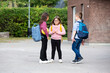 © Johnér - Friends talking on school yard