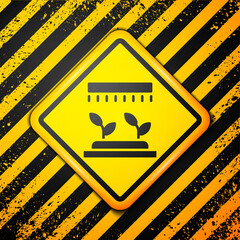 Poster - Black Automatic irrigation sprinklers icon isolated on yellow background. Watering equipment. Garden element. Spray gun icon. Warning sign. Vector.