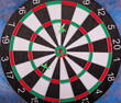 © Renat - Aiming at the target, marketing, advertising and business concept. Darts game.