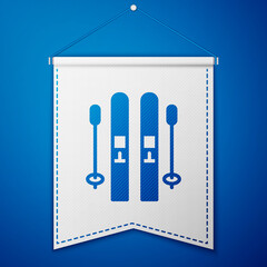 Canvas Print - Blue Ski and sticks icon isolated on blue background. Extreme sport. Skiing equipment. Winter sports icon. White pennant template. Vector.