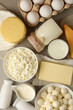 © Atlas - Different fresh dairy products on gray background, top view