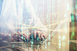 © peshkova - Double exposure of woman hands working on computer and data theme hologram drawing. Tech concept.