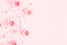 Valentine's Day Background. Pink Flowers, Hearts On Pastel Pink Background. Valentines Day Concept. Flat Lay, Top View, Copy Space
