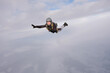 © Sky Antonio - Skydiving. A pretty girl is flying in the sky.