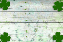 St Patricks Day Background. Shamrocks Over A Light Green Wood Background