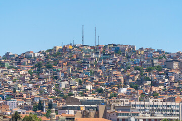 Izmir, Turkey. June 6, 2019: Urban landscape with houses, facades and blue sky.