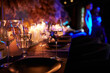 © Bohdan - The served table in the luxury restaurant. Dark wooden table, beautiful evening restaurant with luxury rustic decor