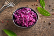 Fermented purple cabbage in a bowl on a table