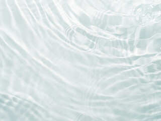 ripple water texture on white background. shadow of water on sunlight. mockup for product, spa or tr