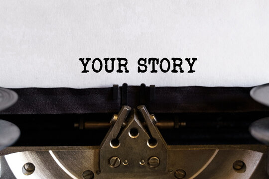 Vintage typewriter with printed text - YOUR STORY, on a sheet of paper