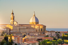 Loreto, Marche, Province Of Ancona. Panoramic View Of The Residence Of The Basilica Della Santa Casa, A Popular Pilgrimage Site For Catholics At Sunset.