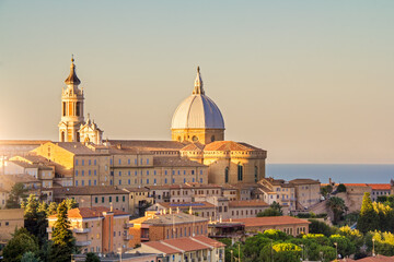 Loreto, Marche, province of Ancona. Panoramic view of the residence of the Basilica della Santa Casa, a popular pilgrimage site for Catholics at sunset.