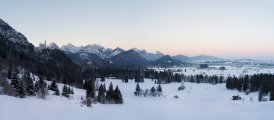 Wall Mural - beautiful winter panorama of neuschwanstein and hohenschwangau castle at sunrise