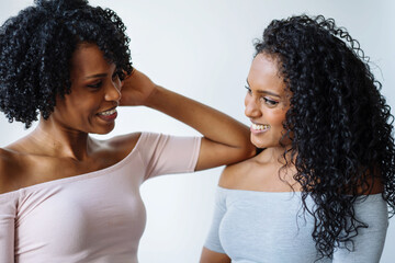 Portrait of two african women looking at each other