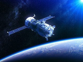 Wall Mural - russian cargo spacecraft in the rays of sun