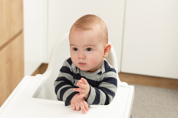 Wall Mural - Child Sitting at Empty Table