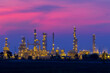 © kamonrat - Pipeline of heavy factory of petrochemical with beautiful sky.