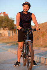 Sticker - Male cyclist with bicycle outdoors