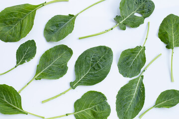 Collard green leaves with holes, eaten by pest. Organic Vegetable