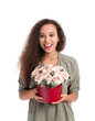 © Pixel-Shot - African-American woman with flowers on white background. Valentine's Day celebration