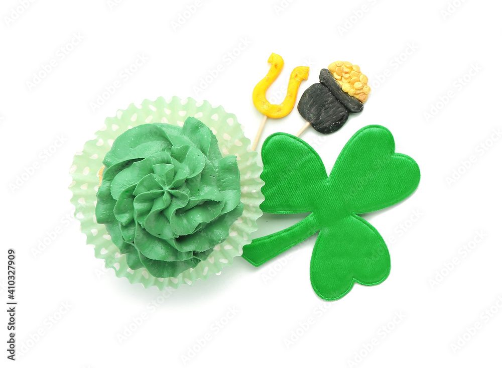 Tasty cupcake for St. Patrick's Day on white background