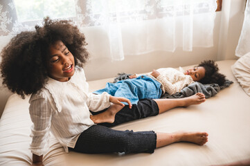 African American children  girl having fun to play with her sister, childhood family at home concept