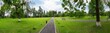 panoramic view of green lawn in public park