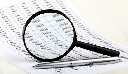 Poster - Graphs, magnifier and pen. Analyzing finances. Concept