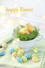 Canvas Print - Happy Easter. chicken in cup and Easter eggs. spring season. festive table decor composition. 