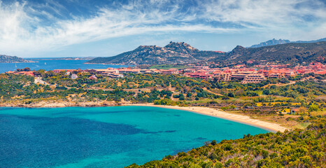 Wall Mural - Beautiful summer view of Sciumara beach. Splendid cityscape of Palau town, Province of Olbia-Tempio, Italy, Europe. Attractive morning view of Sardinia island. Mediterranean seascape.