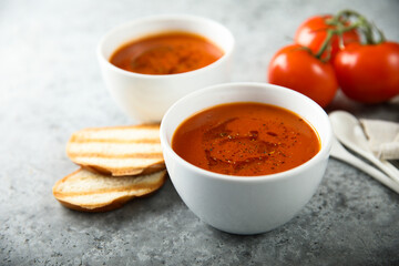 Canvas Print - Homemade spicy tomato soup with grilled bread