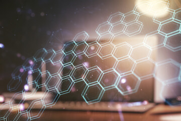 Poster - Double exposure of technology hologram with hexagon on laptop background. Research and development software concept
