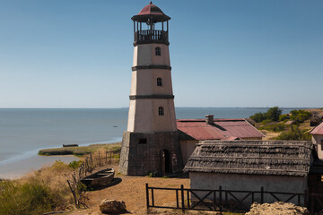 Lighthouse at the beach at the sea