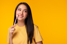 Happy Woman Take Care Tooth And Holding Toothbrush Young Lady Has Beautiful Teeth Beautiful Asian Girl Has Whitening Tooth Nice Tooth Alignment Yellow Background, Copy Space Dental Care