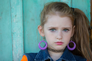 Wall Mural - Little girl with bright makeup in retro style. Child model.