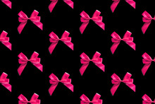 Pink Bows Pattern On Black Background. Gift Wrapping