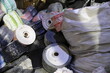 © Andrey - Recycling waste plastic film in rolls