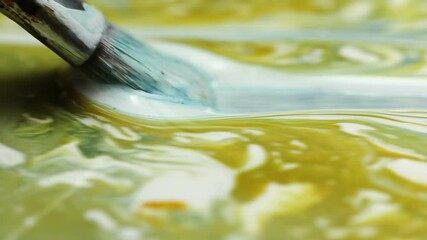 Wall Mural - Brush from side slide in luqiud vivid color mixing together on white. Painting background