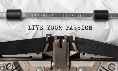 Fototapete - Text LIVE YOUR PASSION typed on retro typewriter