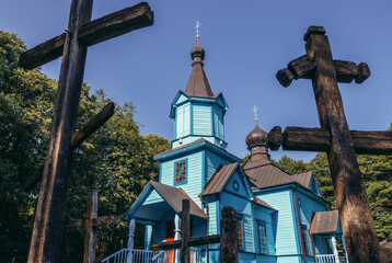 Canvas Print - Crosses in front of Orthodox church in Koterka village, Podlasie region of Poland