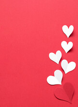Valentine's Day Background. Red And White Hearts On A Red Background.