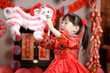 © M-image - young chinese girl with traditional dressing up celebrate Chinese new year